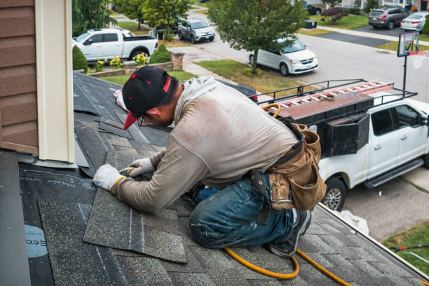 Professional Roofing technician working in Franklin, MA